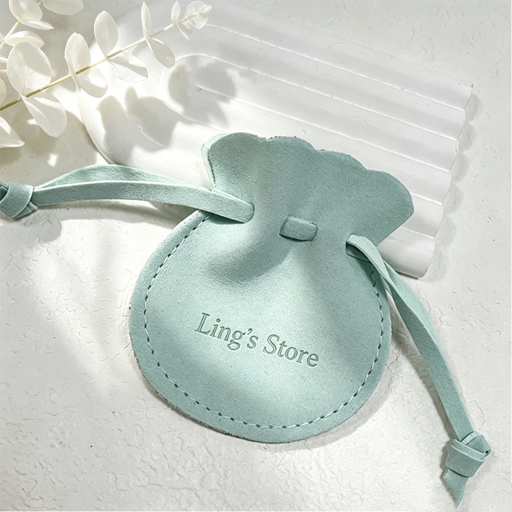 

50Pcs Debossed Logo 7x8cm 8x10cm 3x4inch Jewelry Microfiber Round Drawstring Bag Mini Gift Packaging Rings Earrings Studs Pouch