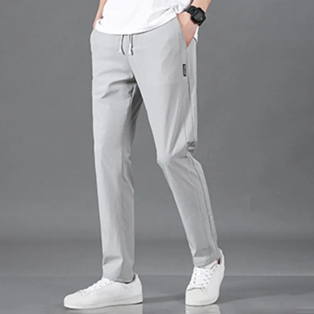 

Ice Silk Casual Pants Slim Fit Quick Dry Men's Gym Training Jogging Sweatpants with Elastic Waist Side Pockets Solid Color Long