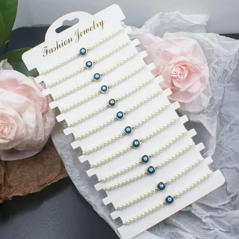 A vintage blue eye pearl bracelet set, perfect for summer beach vacations, unisex, can be given as a gift to friends.