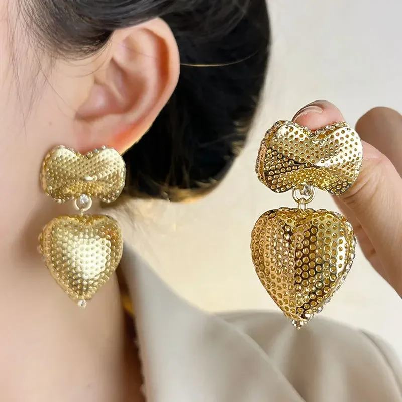 

Retro exaggerated hollow love bow earrings for women