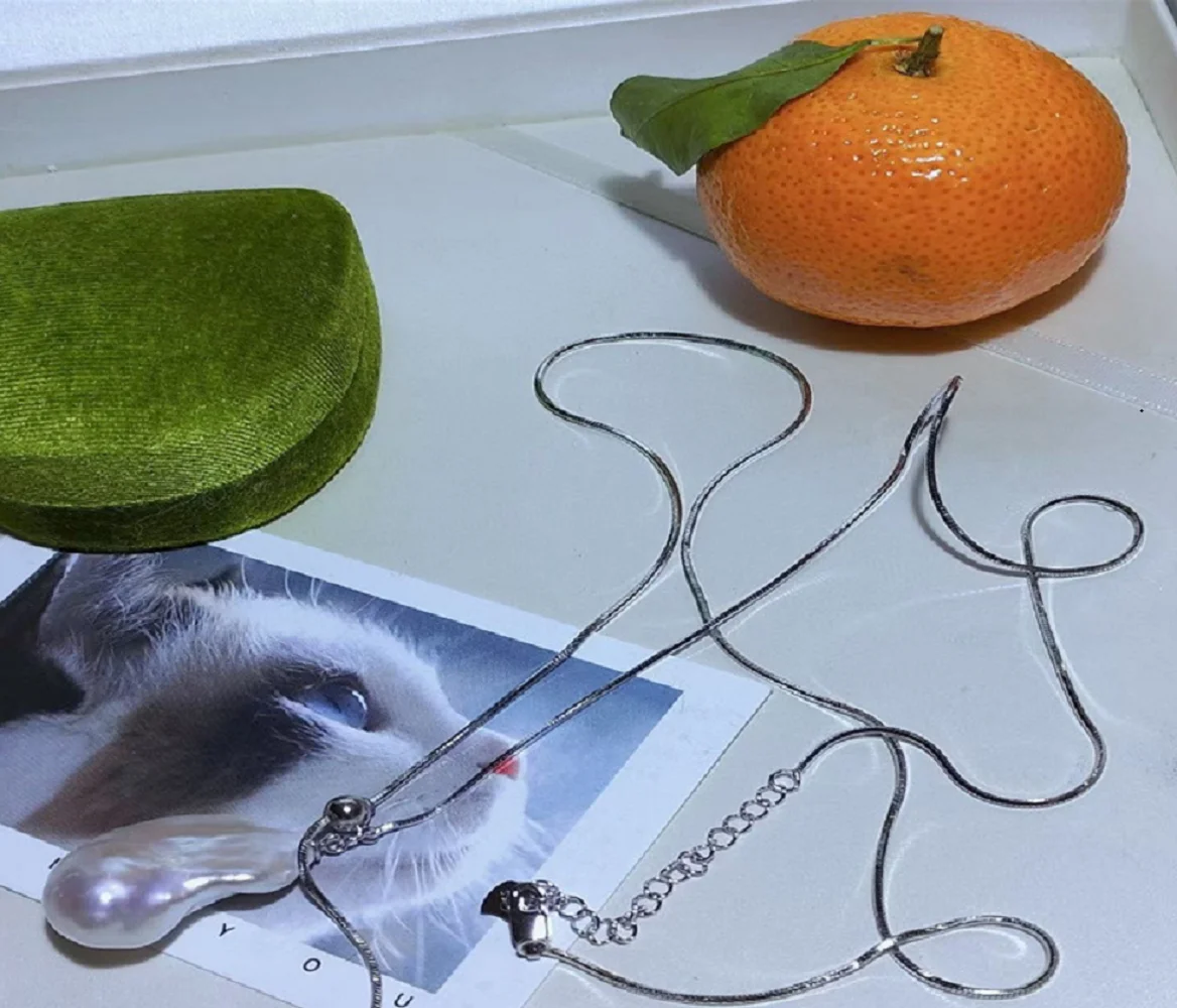 

Natural AAA15-20mm Baroque Pearl Pendant with Zipper 70cm/925s