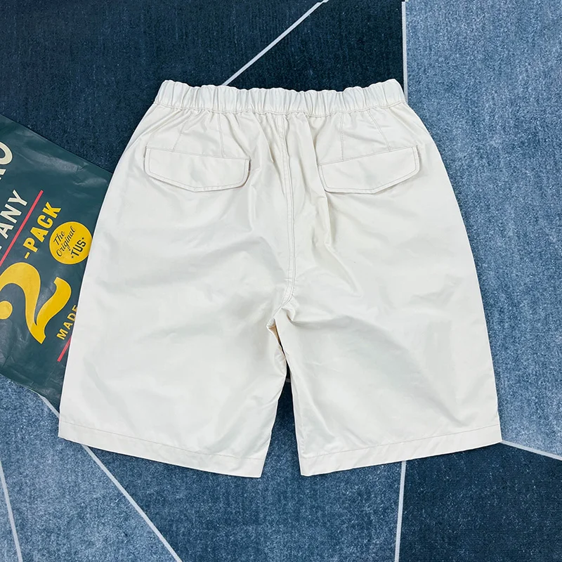 Celana pendek kasual longgar musim panas celana kuartal di atas lutut kaki lurus retro Amerika pria