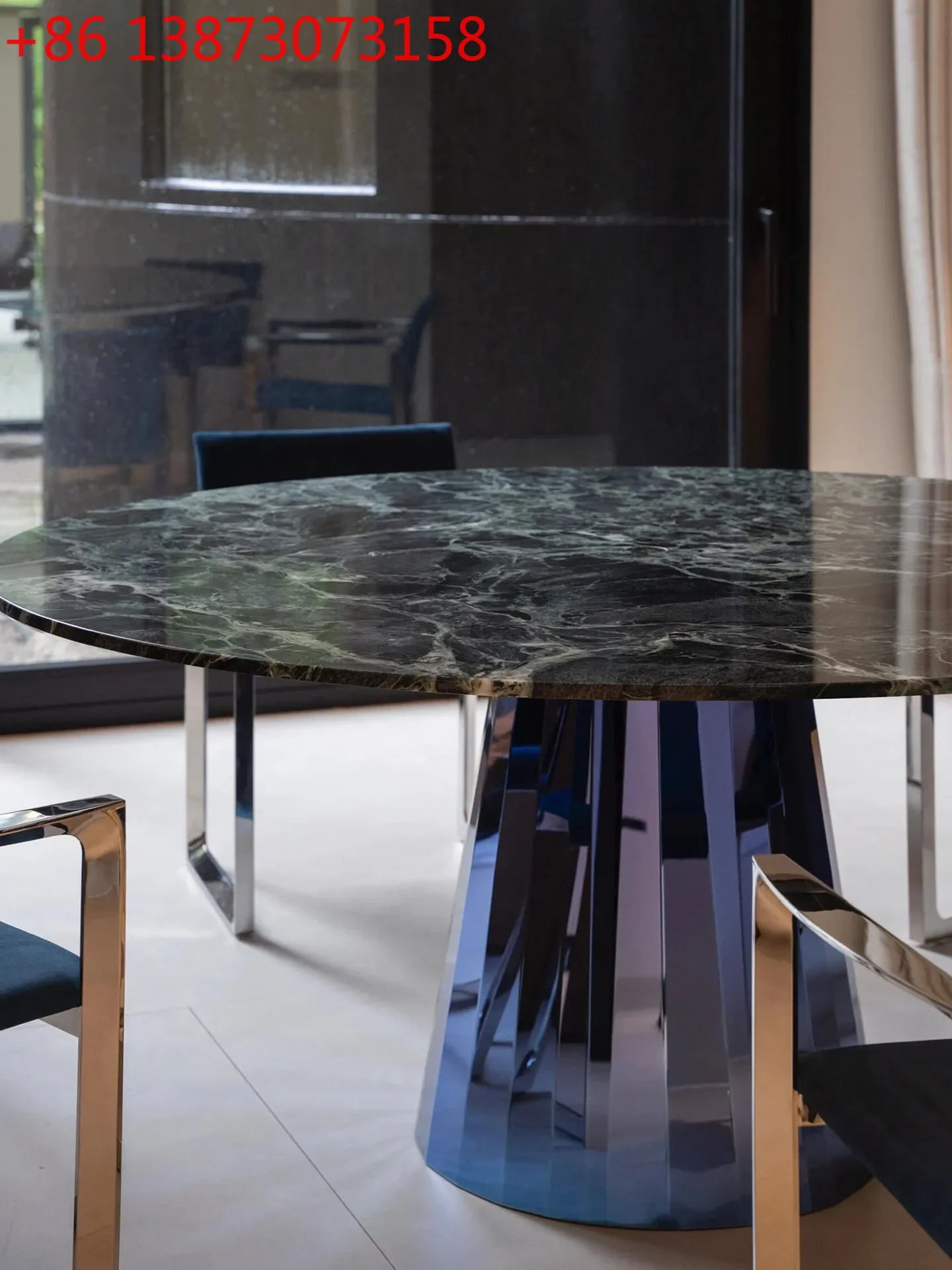 

Italian retro dark green natural marble round dining table 1.1 meters modern simple Prada green luxury stone dining table
