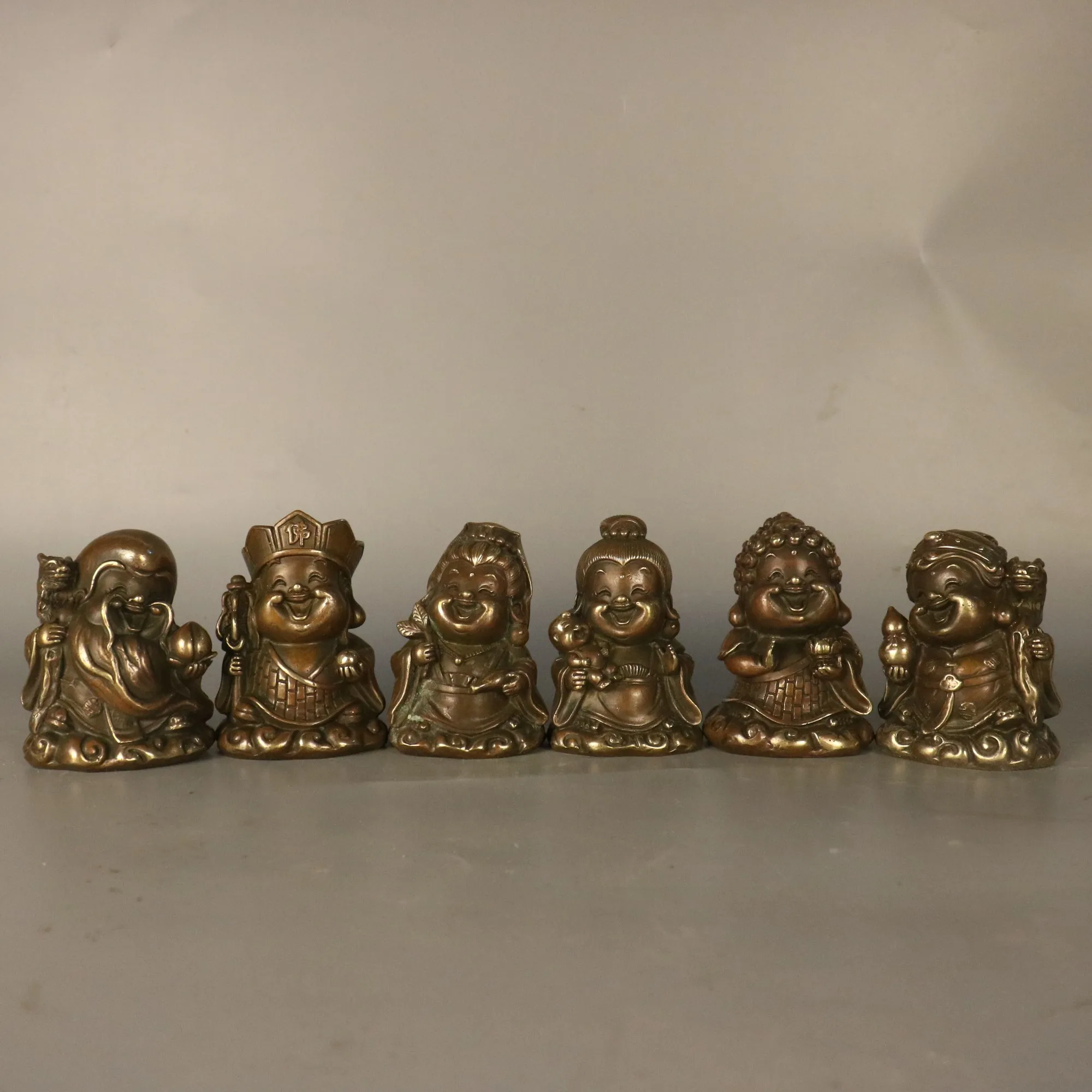 

Bronze cartoon version of Jizang. Guanyin. Buddha, Fulushou Samsung desktop creative decoration ornament