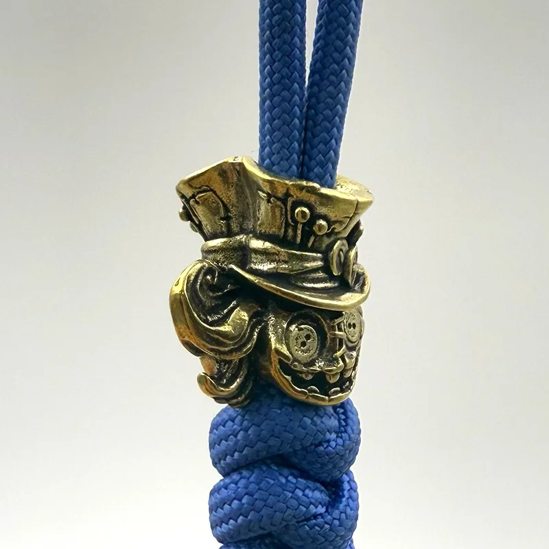 النحاس الوجهين دمية رئيس سكين الخرز EDC DIY Paracord المنسوجة أساور الحبل المعلقات اكسسوارات أداة خارجية الشنق