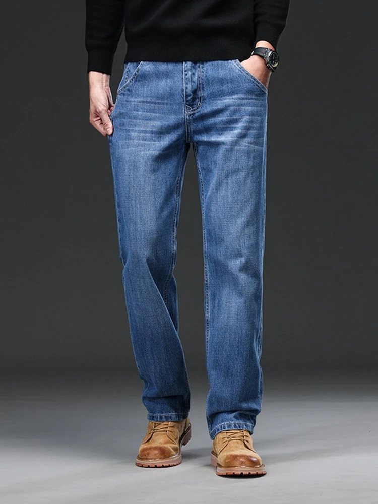 

Autumn new casual plus size straight jeans 38--48 fashion men's pure cotton simple and loose business fattening jeans.