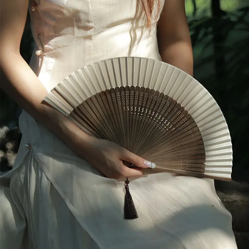 

Elegant fan folding fan Chinese style ancient style small fan frame complex classical Hollow Summer fan ancient style