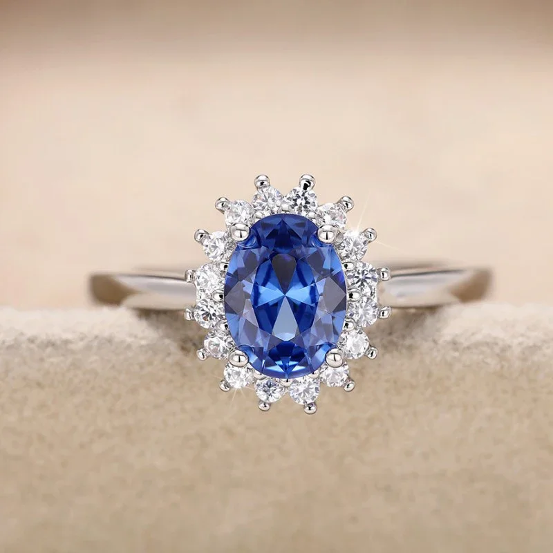 Huitan Elegante Oval Blau CZ Frauen Ringe Ästhetische Sonnenblumen Design Silber Farbe Ringe Hochzeitstag Party Dame Schmuck