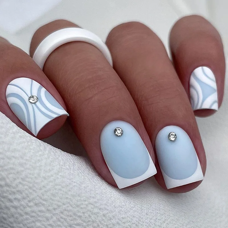 

24Pcs Medium Coffin Press-on Nails: Light Blue Base with White Border, Irregular Patterns & Rhinestones - Matte Elegant Style