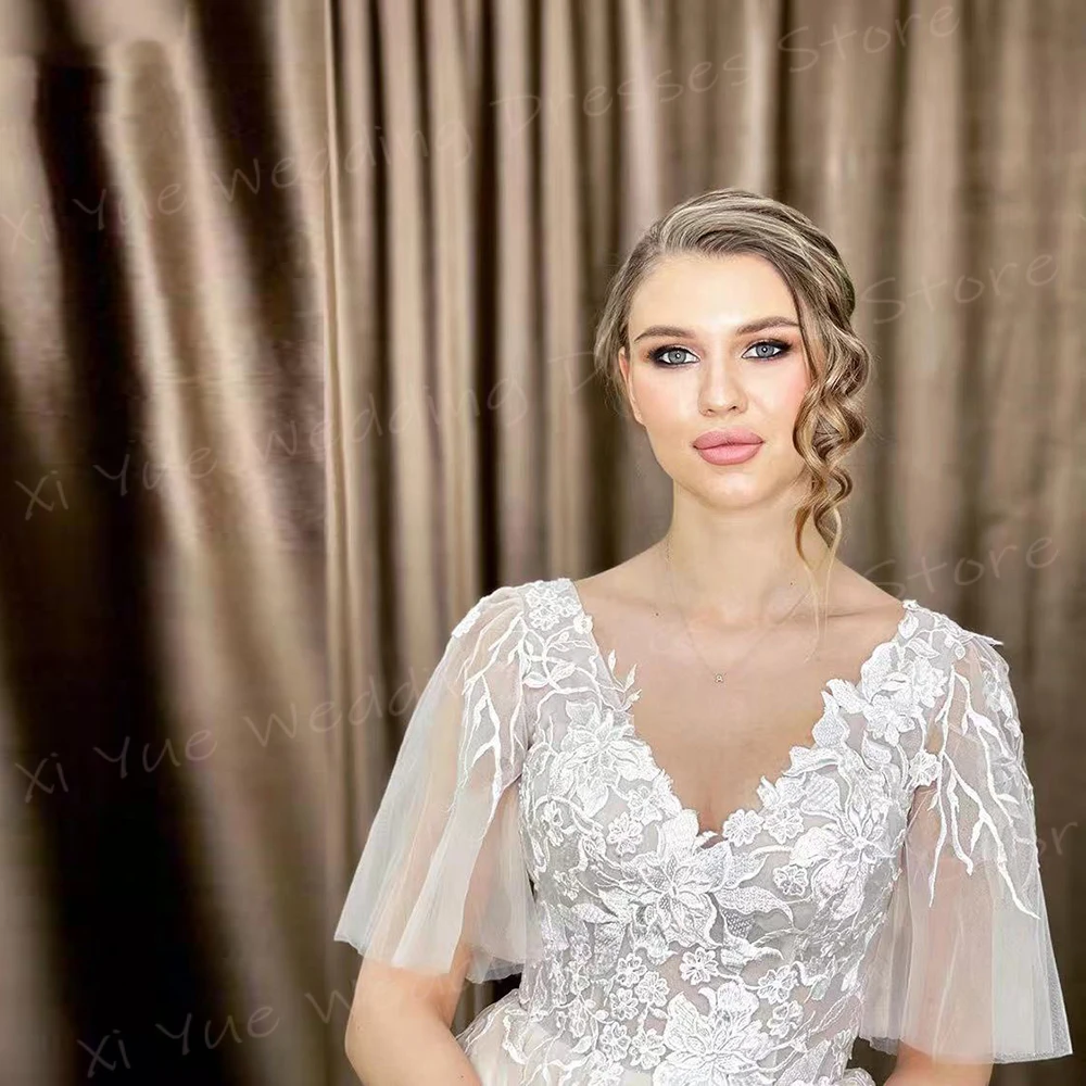 2025 Romantico A Line Abiti da sposa per le donne Appliques in pizzo Abiti da sposa Affascinante scollo a V manica corta Tulle Vestido De Novia