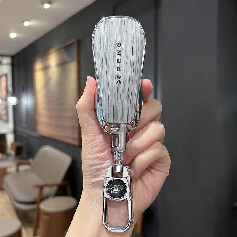 For Xiaopeng xpeng p7 p7i p5 g3 g3i g9 g6 22-23 High grade imitation wood grain key case metal key chain