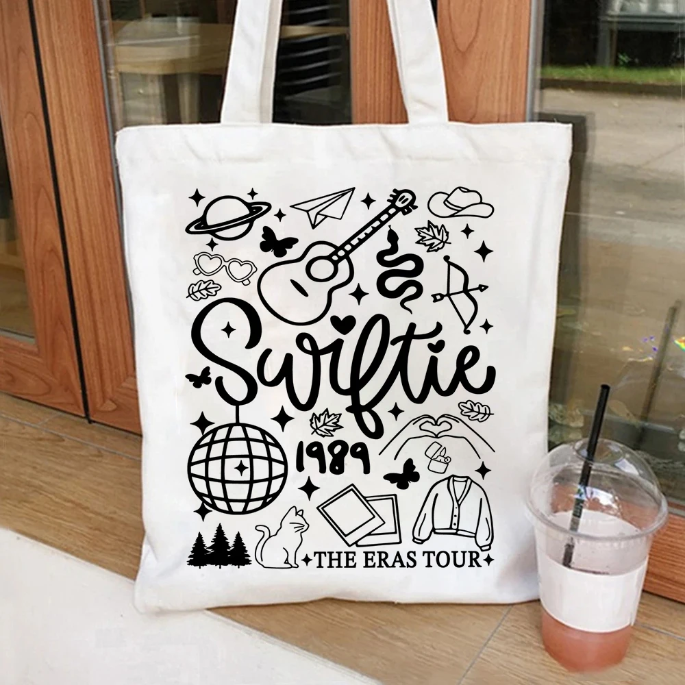

Swiftie 1989 The Eras Tour Canvas Tote Bag Cartoon Female Shoulder Handbag Girl Handbags Large Capacity Shopping Bags