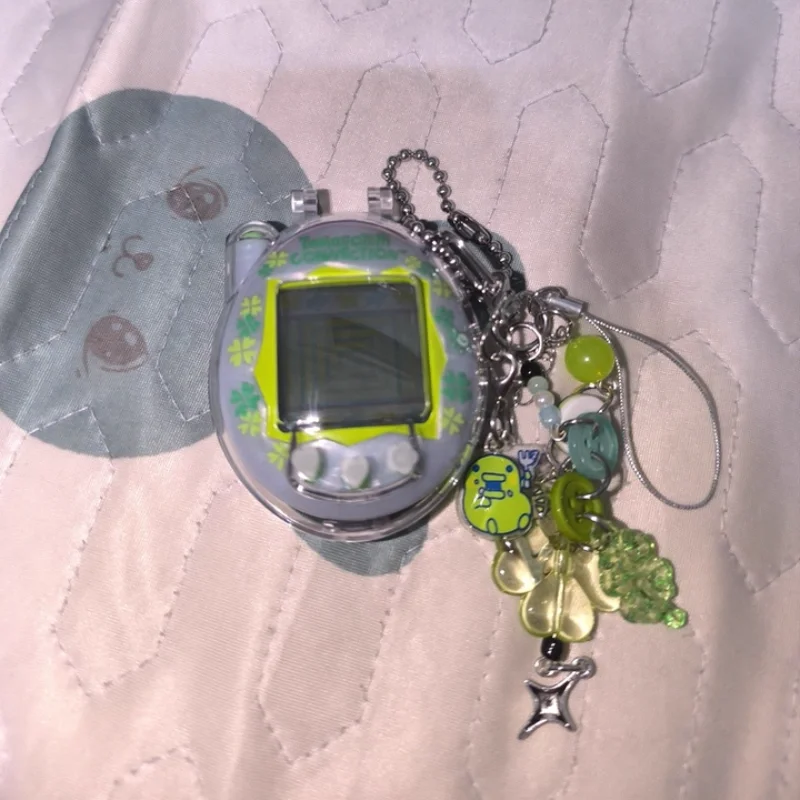 ของแท้จาก Bandai แทมาก็อตจิ เกมสัตว์เลี้ยง ของเล่นเครื่องเล่นเกมสัตว์เลี้ยง ของสะสม ฟิกเกอร์ตกแต่ง ของขวัญวันเกิด