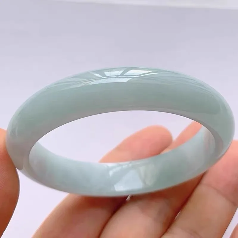 Myanmar ice waxy jadeite , single-color, from an old mine, green inclusions, round bracelet for women, with a moist