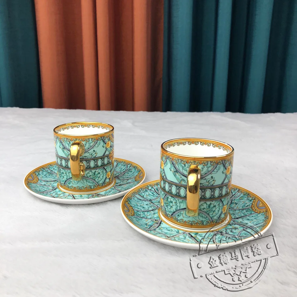 

New trendy gold edged tableware, coffee cup, hotel model room dining table, steak, Western cuisine, couple coffee cup, plate