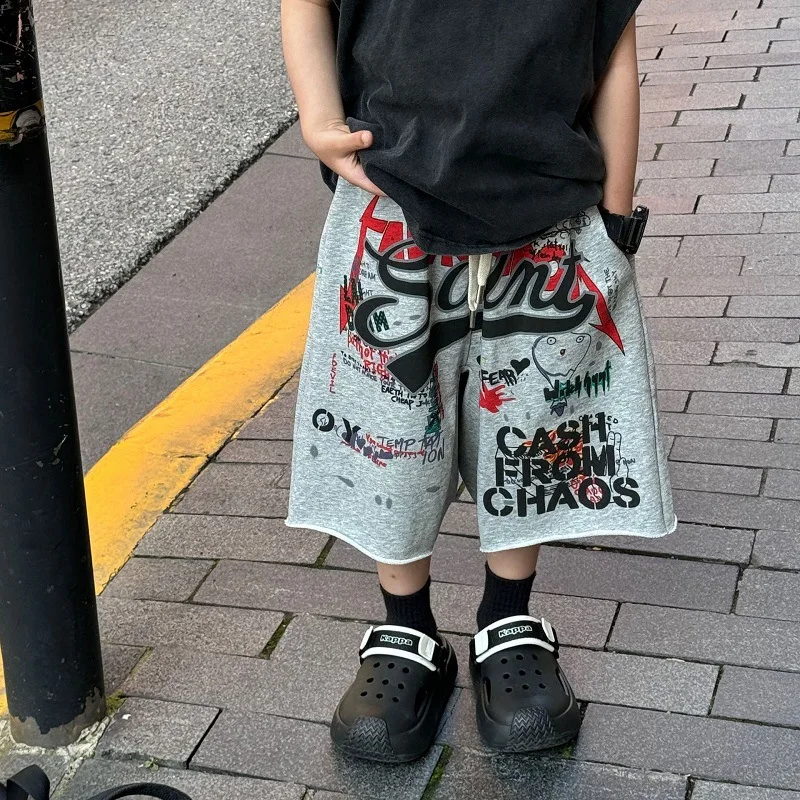 

2025 Summer New Korean Edition Boys' Fashion Trendy Cool Versatile Graffiti Casual Sports Pants Children's Stylish Shorts Trendy