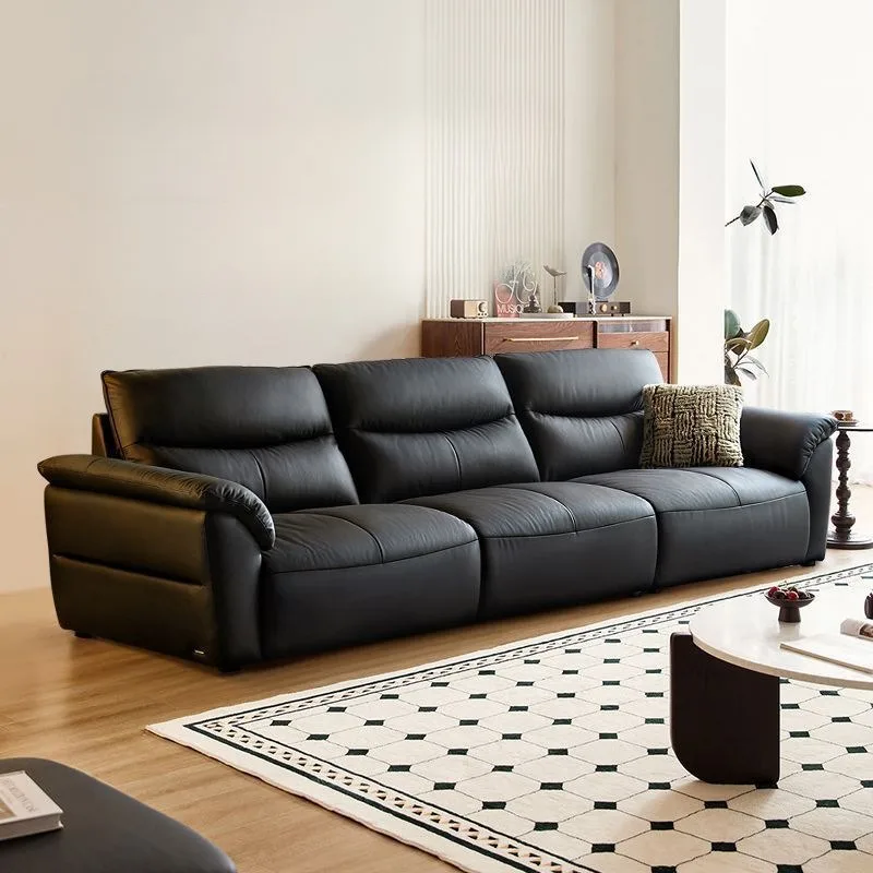 Большая черная корова, мягкий островный диван, светлый роскошный стиль, клавиши фортепиано для гостиной