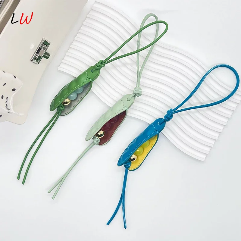 Bolsa de cuero de vaca hecha a mano con forma de guisante, llavero verde, mochila, calidad de alta gama, mano de obra exquisita, accesorios para bolso