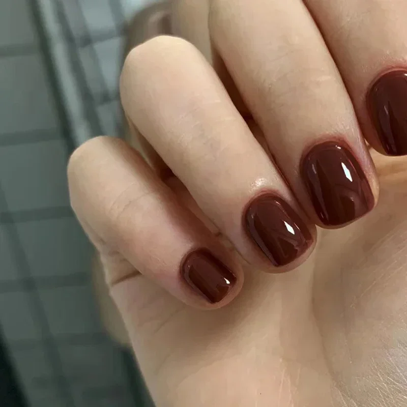 

24 Pcs Short Simple False Nails with Tools Simple Cheap 2026 Red Brown Press on Nails Reusable Adhesive Fake Nails with Charms