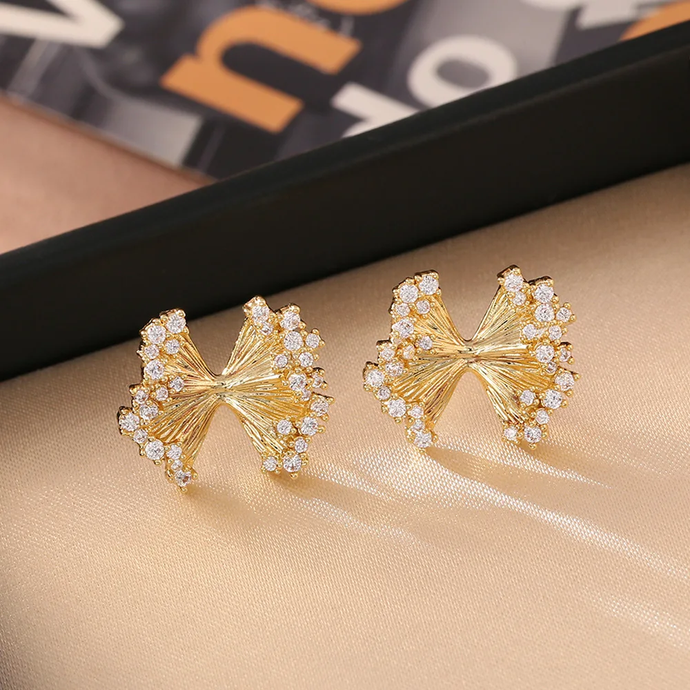 

Pleated zircon bow silver needle earrings, high-end, fashionable and personalized earrings, niche design, exquisite earrings