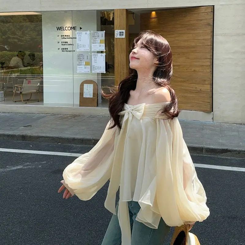 

French One-shoulder Bubble Sleeve Shirt for Women with Irregular Bow Design in Early Spring with Off-the-shoulder Women's Top