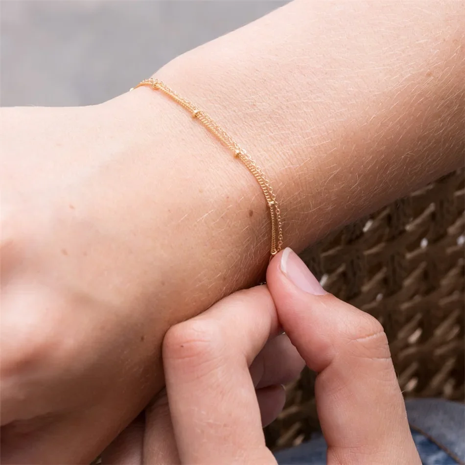

Waterproof Chain Bracelet Delicate Gold Color PVD Plated Stainless Steel Thin Singapore Starburst Layered Bracelets for Women