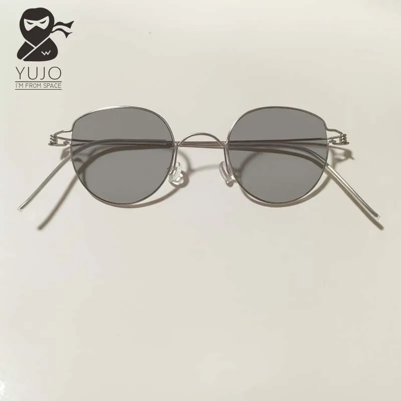 Handmade vintage cat eye shaped metal screwless UV400 sunglasses suitable for both men and women with sunnies light gray lenses