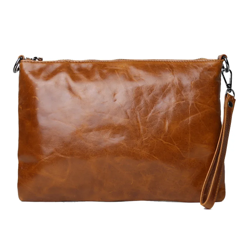 حقيبة كروس كلاسيكية من الجلد المشمع والحبوب العلوية 2025 تصميم جديد بسيط للجنسين محفظة بمقبض ذات سعة كبيرة #1