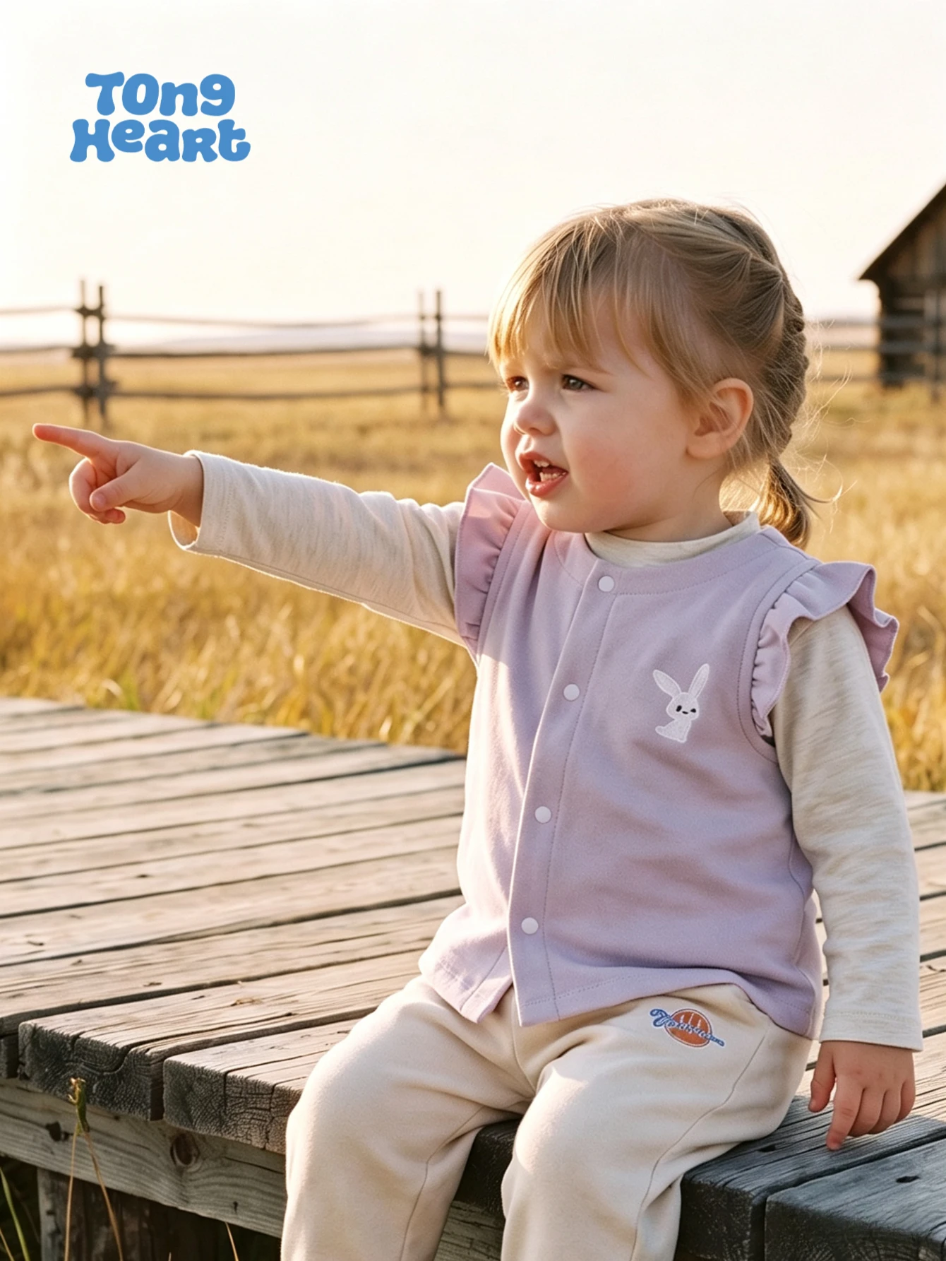 TongHeart Baby Double-Sided Jacket - Can be worn on the front or the back. This is a children's outerwear item suitable