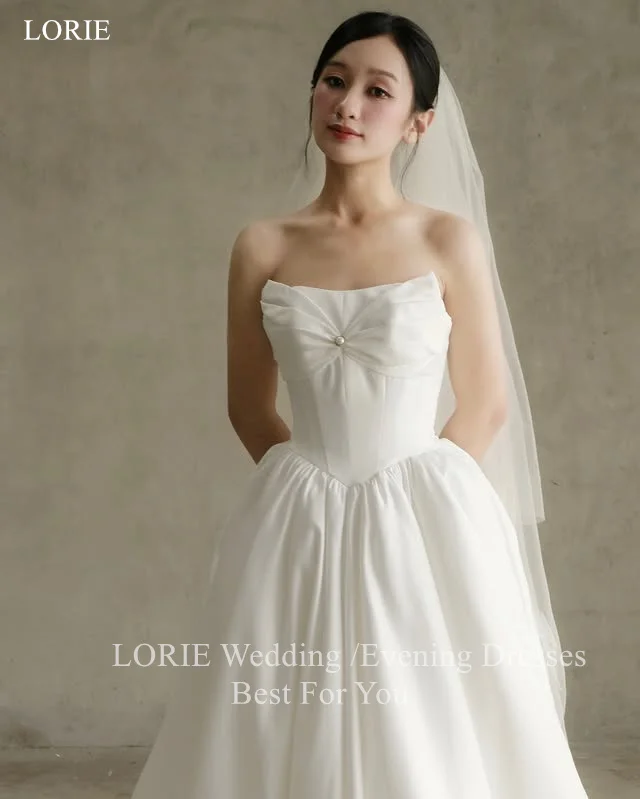 LORIE elegante satijnen strapless trouwjurken a-lijn mouwloze bruid galajurk strik parels geplooide bruidsjurken op maat