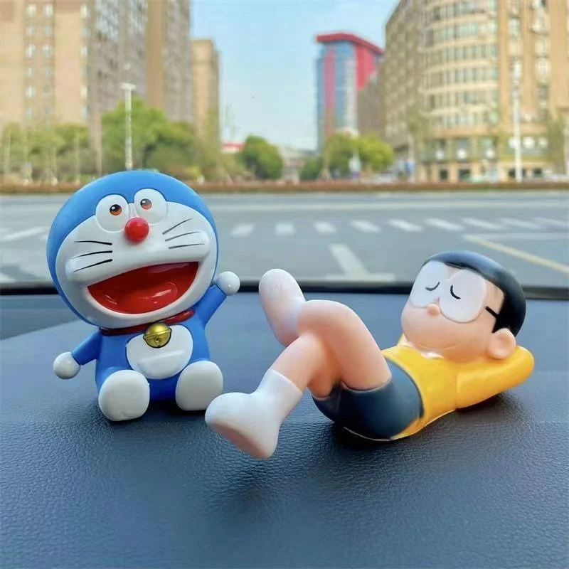 Sleeping Doraemon electric motorcycle decor small accessories figurines electric battery waving car