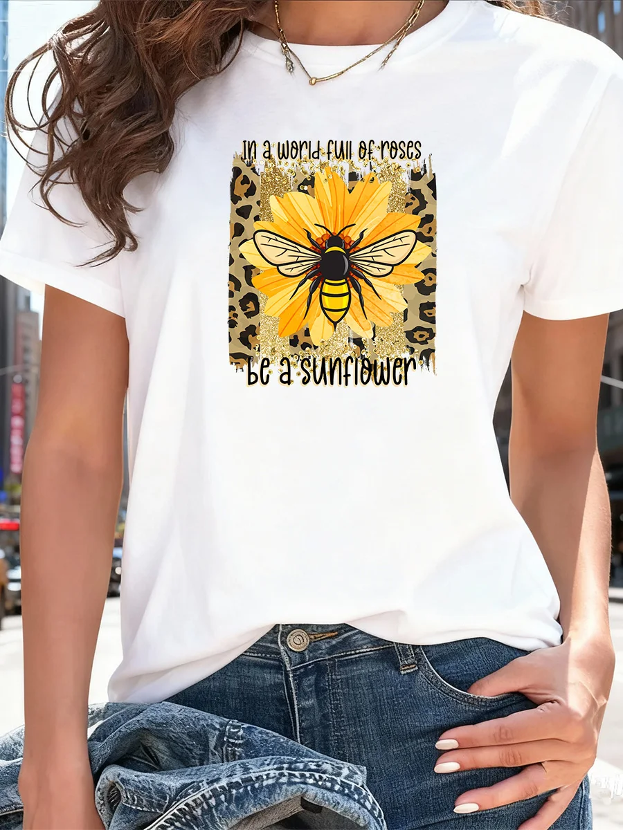 

White Short Sleeve T-Shirt with Sunflower & Bee Print, Leopard Background, "In a World Full of Roses Be a Sunflower" Quote
