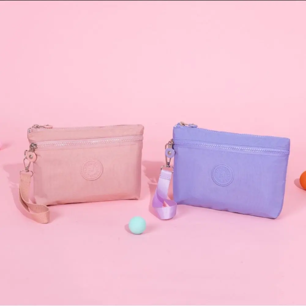 

Double Zippers Solid Color Coin Purse Large Capacity Cosmetic Bag Wrist Phone Purse Nylon Niche Design Small Phone Bag Men