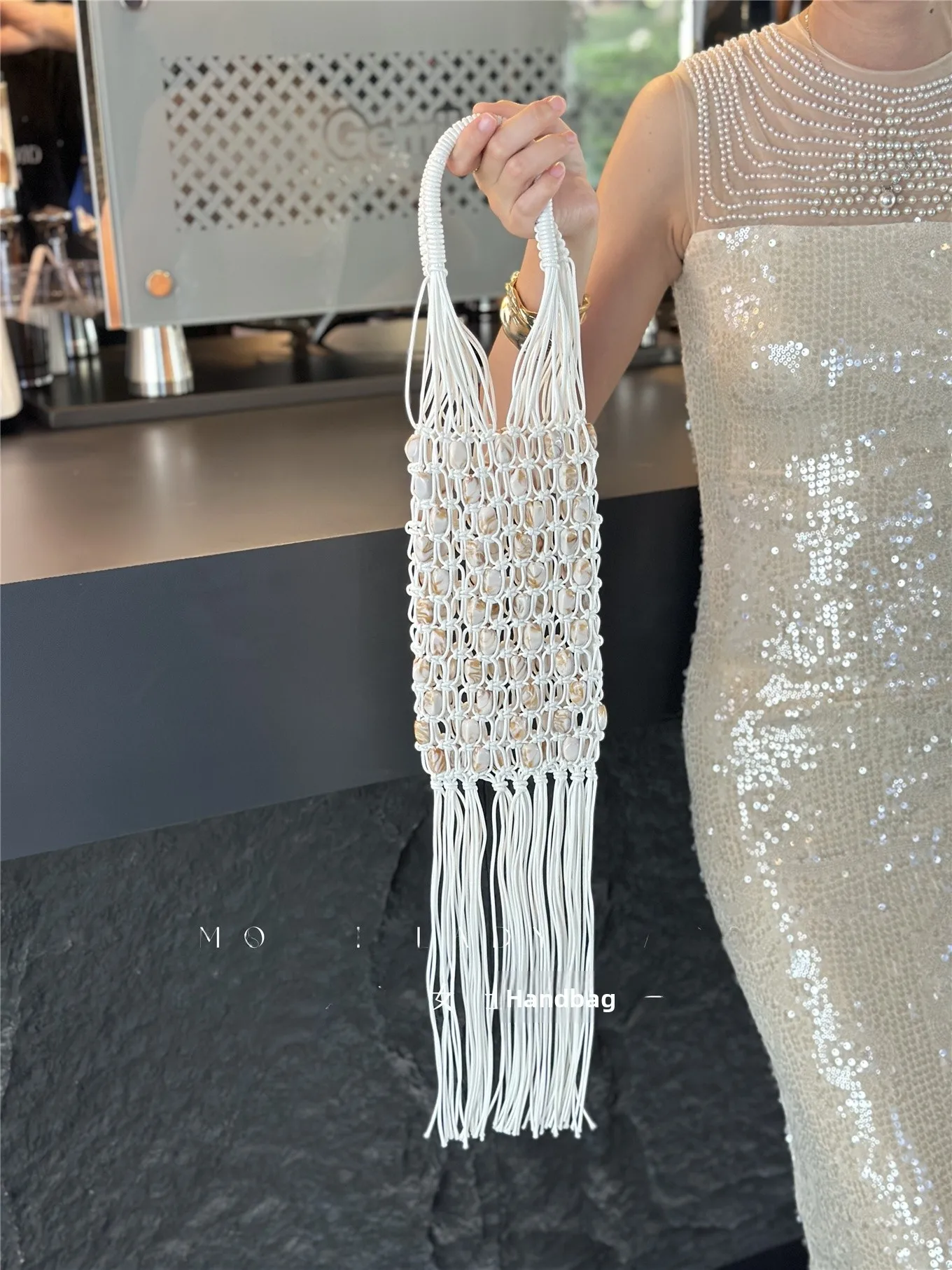 

Handwoven Net Pearl Hollow out Bucket Bag Women's Handbag Summer 2026 Retro Small Luxury Goods Bucket Handle Carry-On Bag