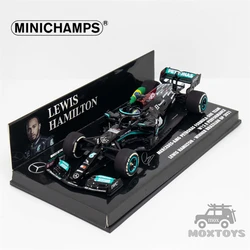 MINICHAMPS 1:43 2021 F1 MB PETRONAS W12 E No44 L.HAMILTON  1ST BRAZILIAN W/FLAG Model Car