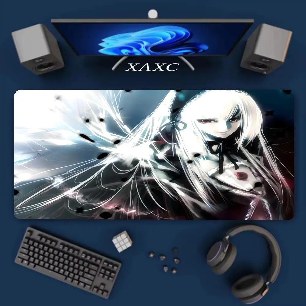 Elevate your setup with dark elegance. This themed mouse pad features striking artwork, providing a smooth,  base for your  XAXC
