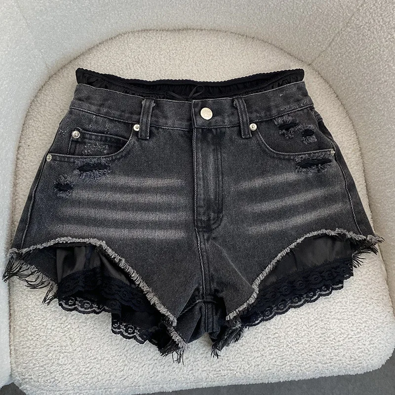 2025 nuova nicchia per fare vecchi jeans strappati con bordo grezzo falsi due pezzi di pantaloncini patchwork da donna pantaloni corti da donna