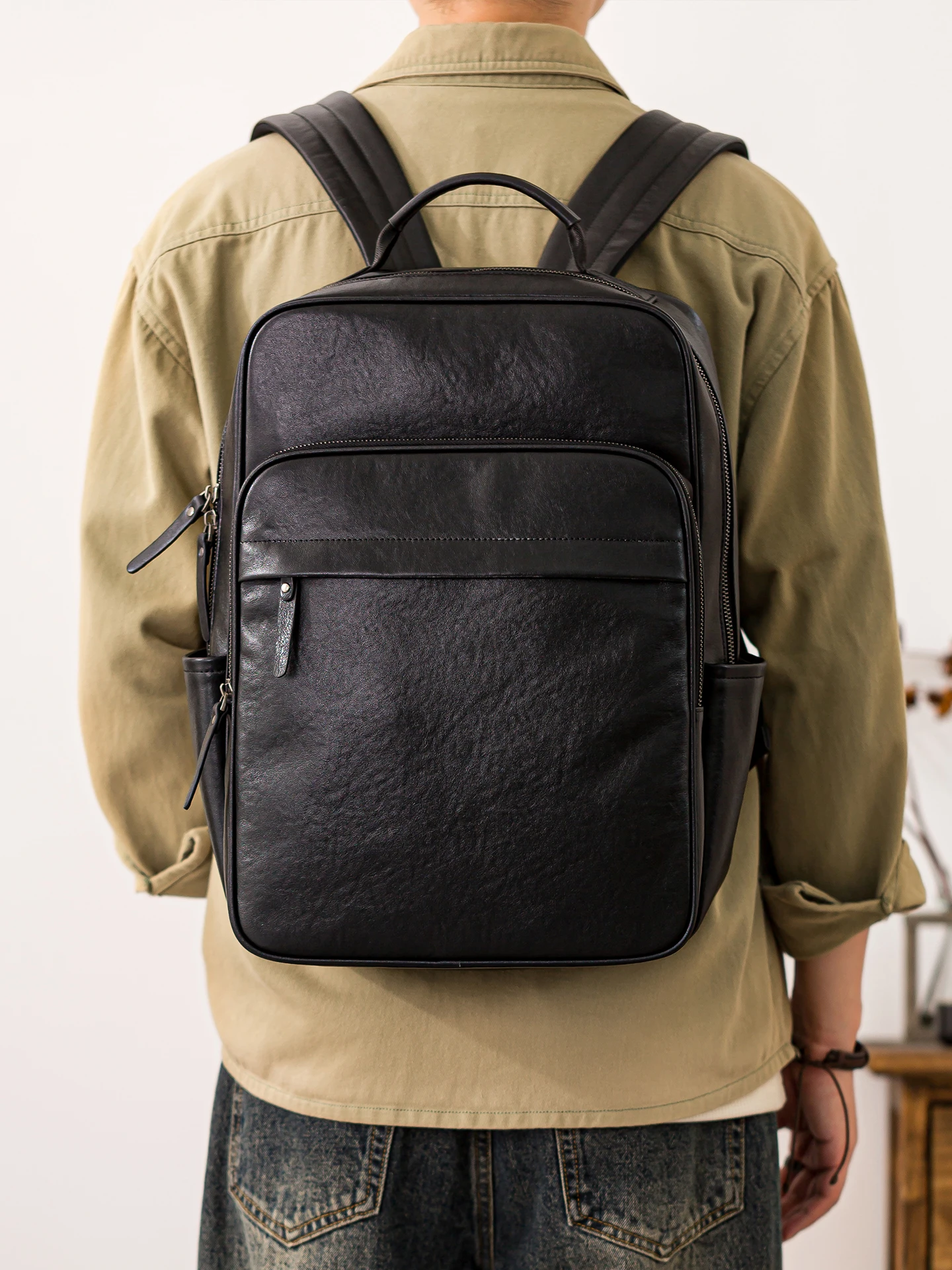 PNDME outdoor travel luxury genuine leather men's laptop backpack simple casual designer handmade cow leather black bookbag