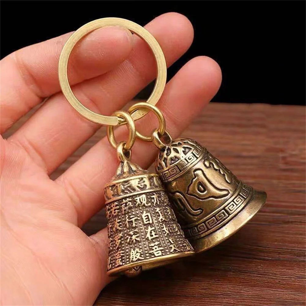 1 Uds. Llavero con campana de Mantra de seis caracteres, llavero con colgante de campana de Sutra en forma de corazón para regalos de fiesta, joyería Unisex ﻿