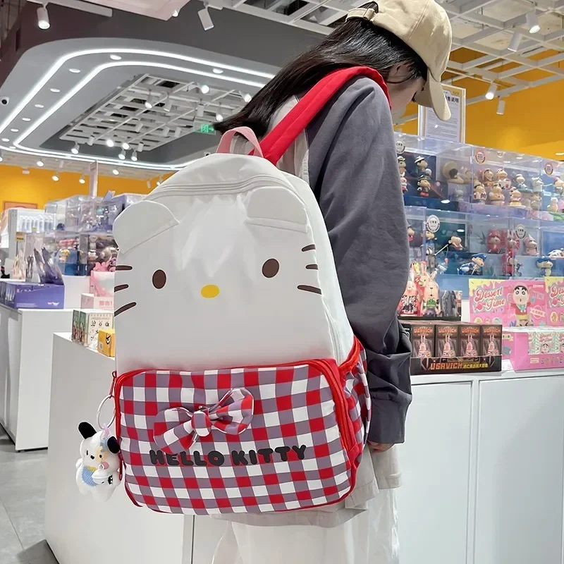 

Sanrio hello kitty Cartoon Female Backpack Cute Plaid Schoolbag Capacity Student Handbag Nylon Shoulder Bag Travel storage bag
