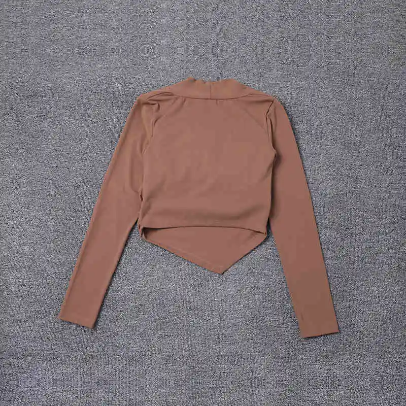 

New fixed chest pad for women's long-sleeved close-fitting yoga fitness T-shirt for autumn and winter.