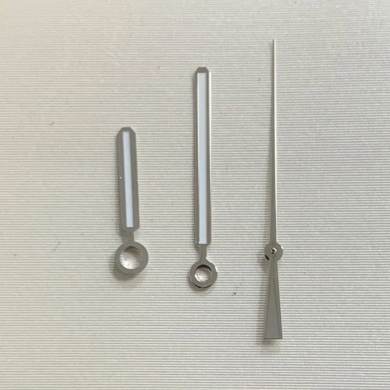 عقارب ساعة مضيئة باللون الأخضر لحركة NH35 مؤشرات ساعة فضية/وردية لساعة اليد ذات الطلب 31.8 مللي متر جزء معدل