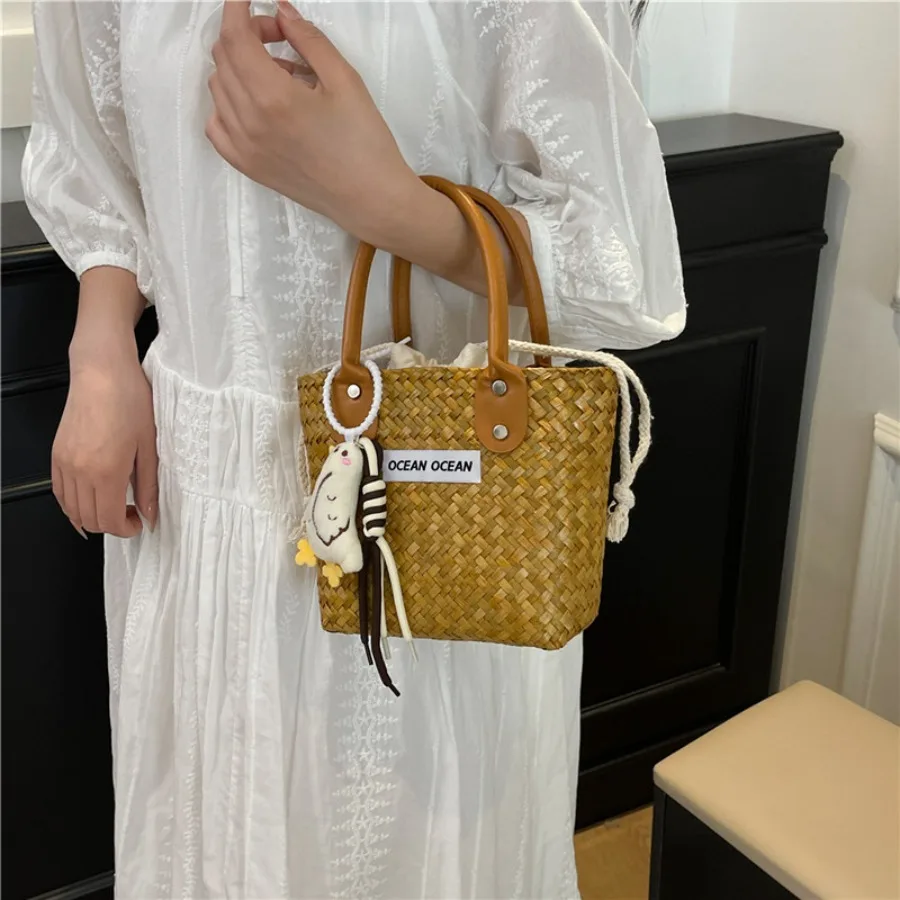 

Высококачественная универсальная мини-сумка, ниша 2025, новая модель сумки через плечо для пляжного отдыха, модная тканая сумка с корзиной для овощей