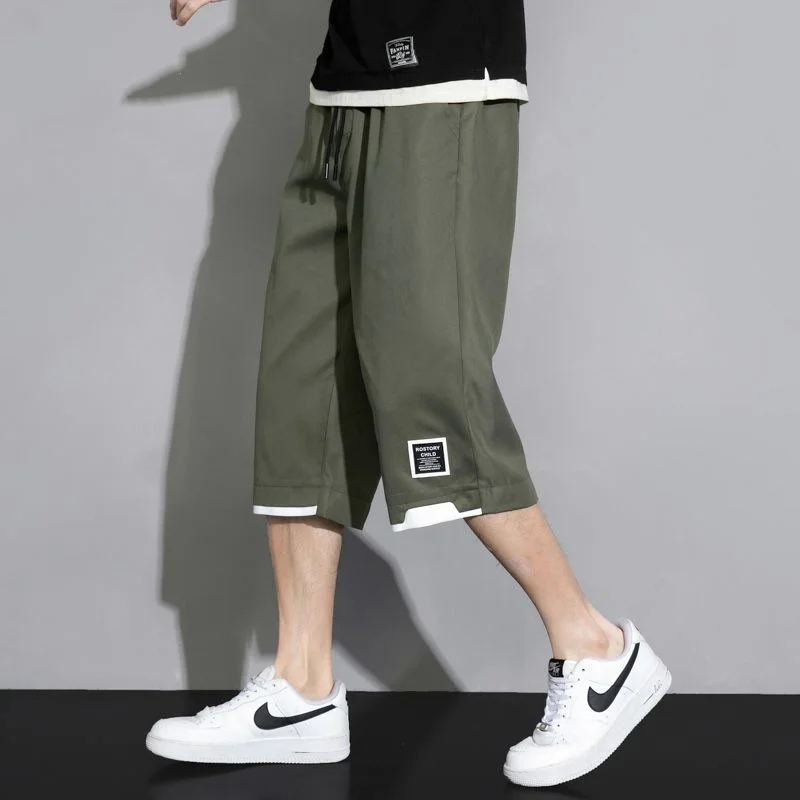 Summer Man Versatile Casual Shorts Koreon Streetwear Fashion Elastic Waist Baggy Khaki Black Green Big Size New Capri Pants 8XL