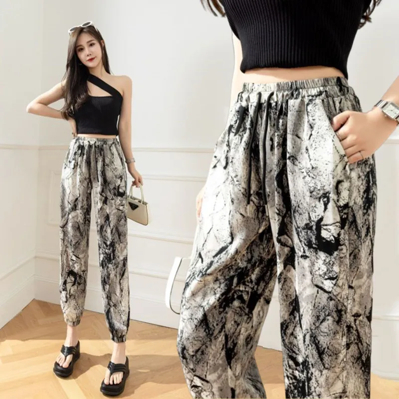 

Summer Thin Ice Silk Loose Sports Casual Pants Women's plus Size Elastic Cuffed Lantern Pants Mosquito Repellent Flower Pants...