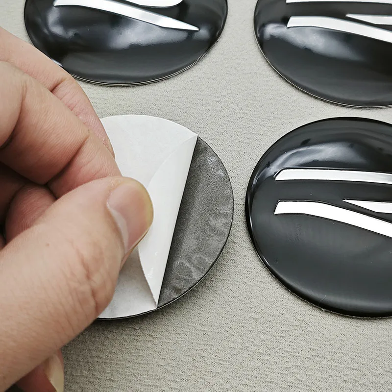 4 قطعة غطاء مركز عجلة السيارة محور قبعات شعار R شارة ملصق ل Volkswagen VW جولف ساجيتار باسات بيتل توران أطلس T-Roc