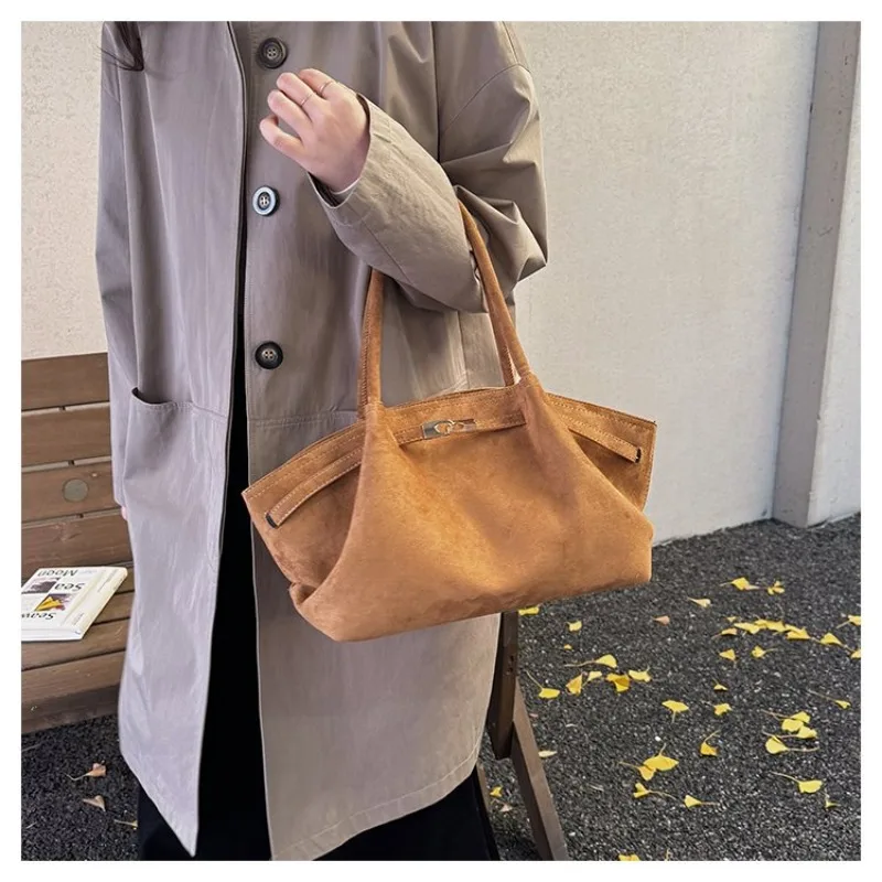 

Elegant Functional Diaper Bag Tote Parenting Travel Business Trip Exquisite Glamorous Timeless Versatile Practical Organized