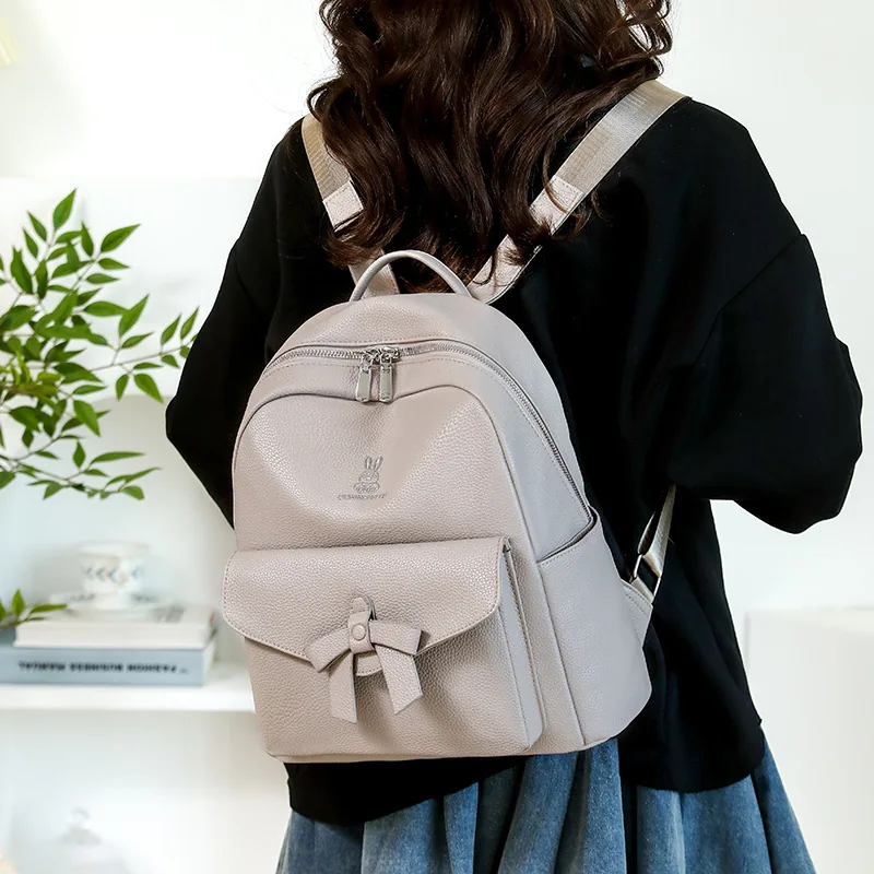 2025 autumn new large capacity women's backpack features bow design and simple and versatile soft PU schoolbag