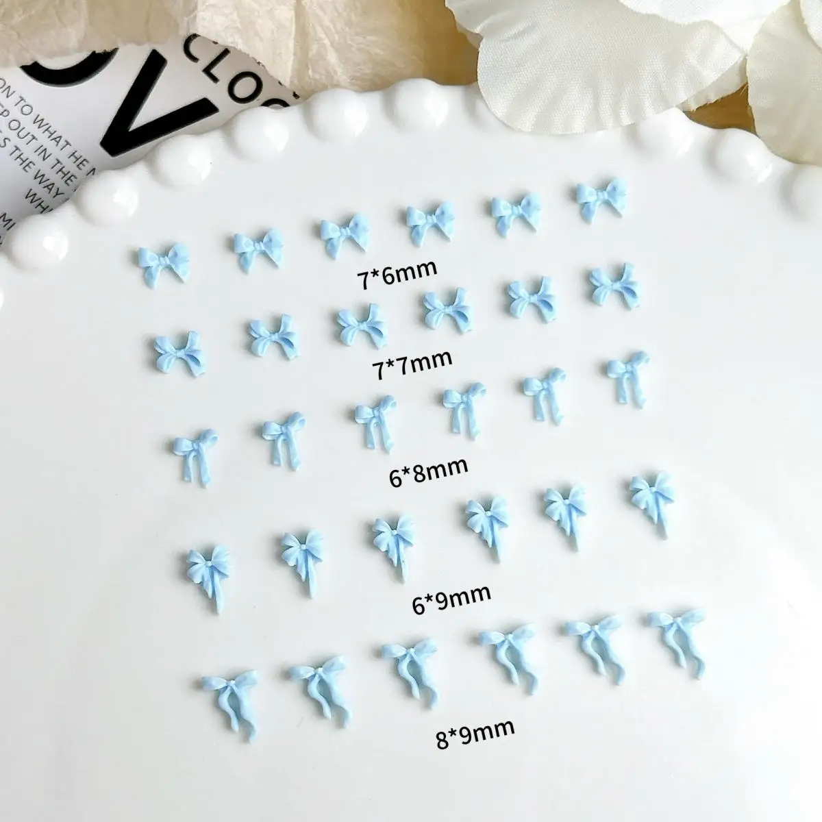 60 SZTUK Żywica 3D 5 stylów Mini kokardki do paznokci Przezroczysta niebieska kokardka Ozdoba do paznokci Etui na telefon Spinka do włosów Akcesoria do majsterkowania