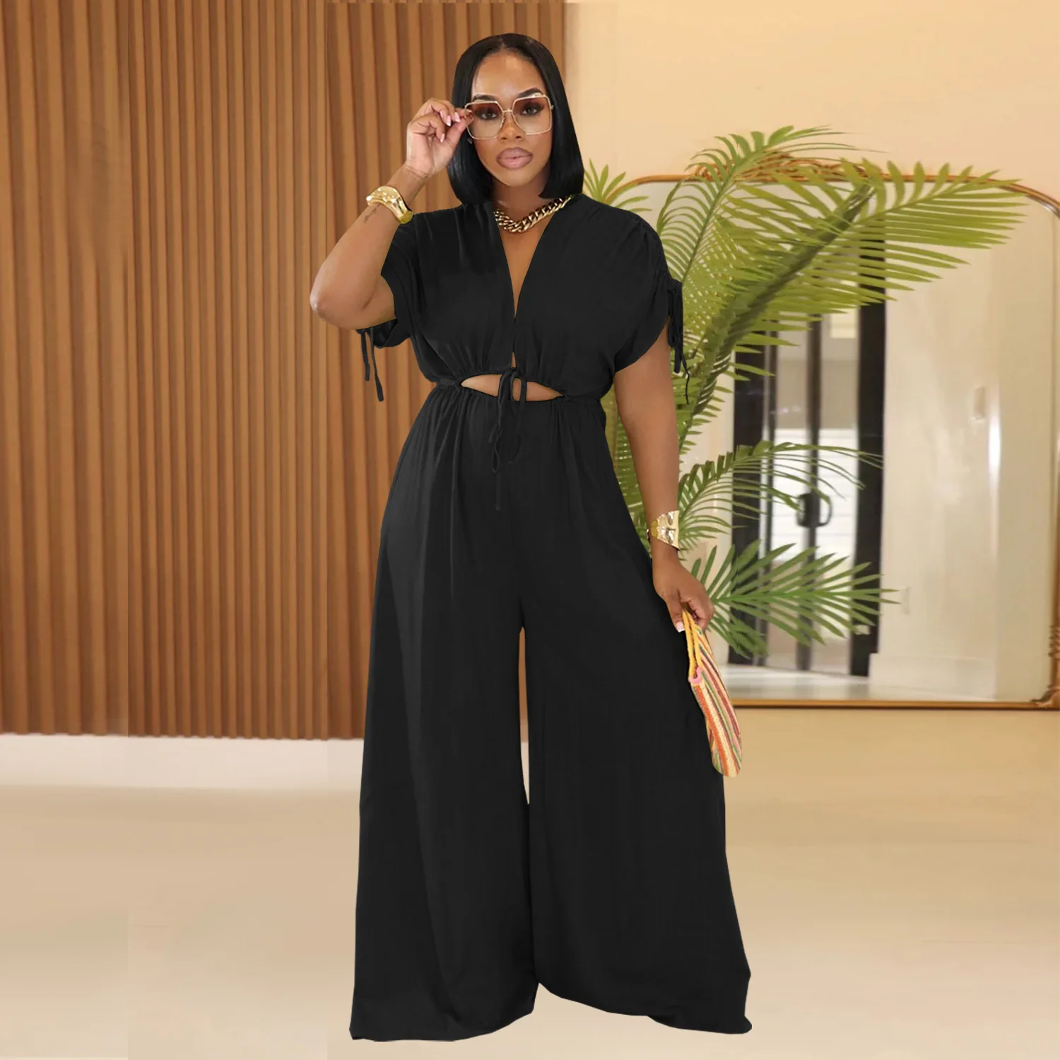Traje de moda europea y americana personalizado para mujer, mono informal de color sólido con cuello en V y cordones de pierna ancha, nuevo estilo